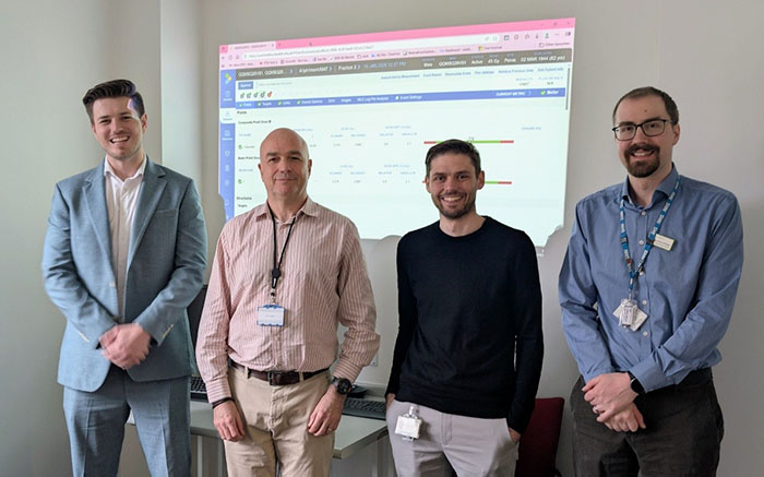 Nathan Flannery, Sales Director at Xiel, with Leeds Cancer Centre team, celebrating the successful implementation of PerFRACTION